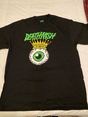 Black Short-Sleeve Tee with Green Eyeball Graphic
